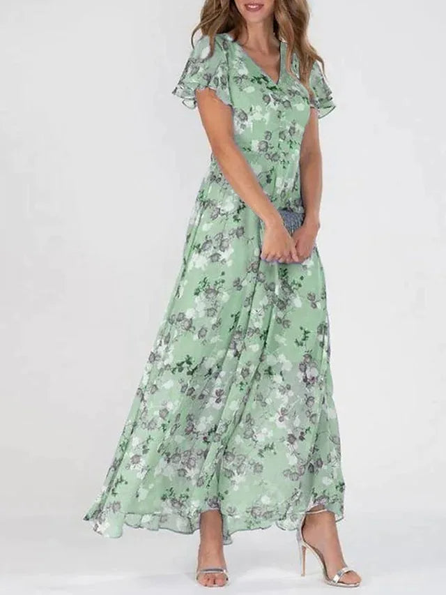Farverig og elegant kjole