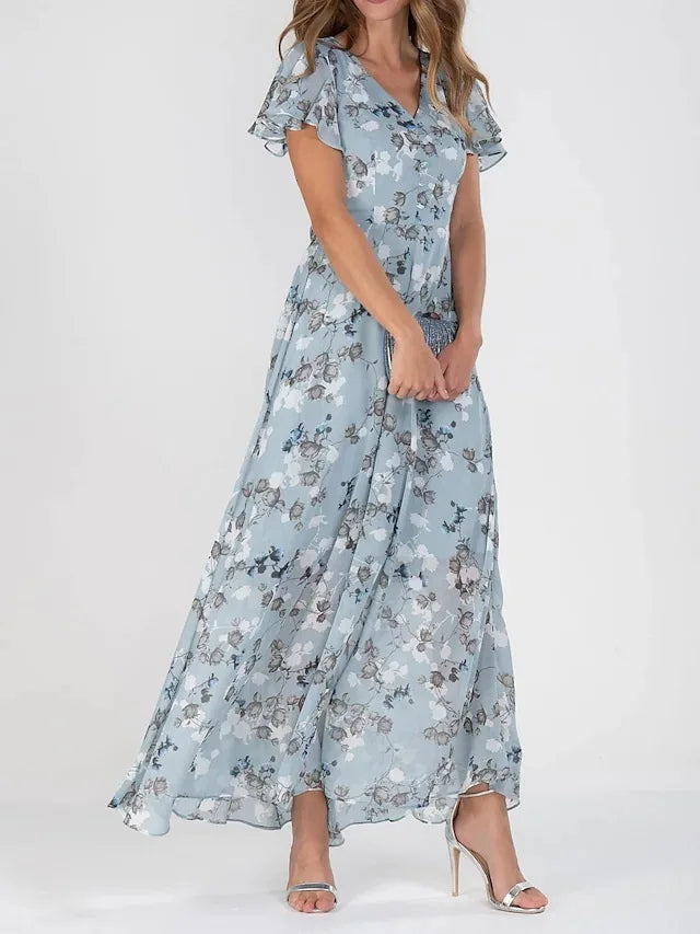Farverig og elegant kjole